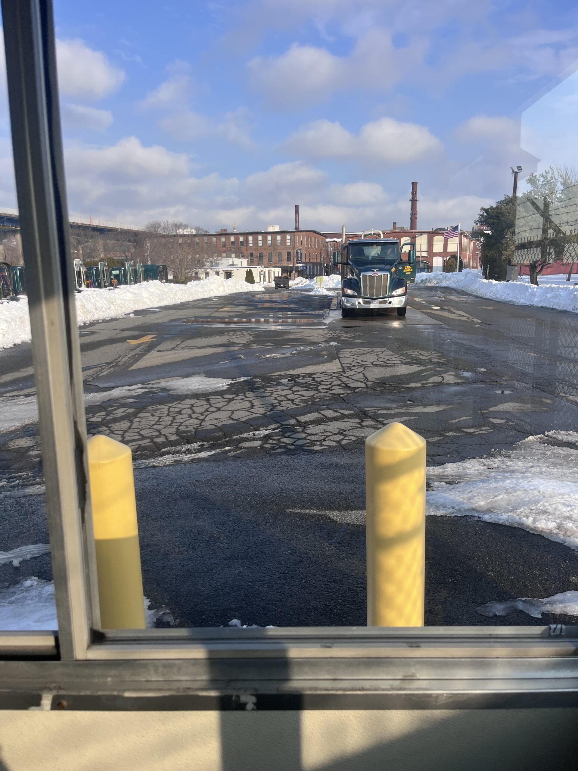SecurityRI officer conducting exterior patrol at Fall River industrial property