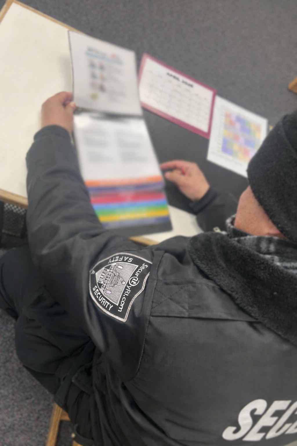 SecurityRI officer maintaining safe access control at Providence educational facility